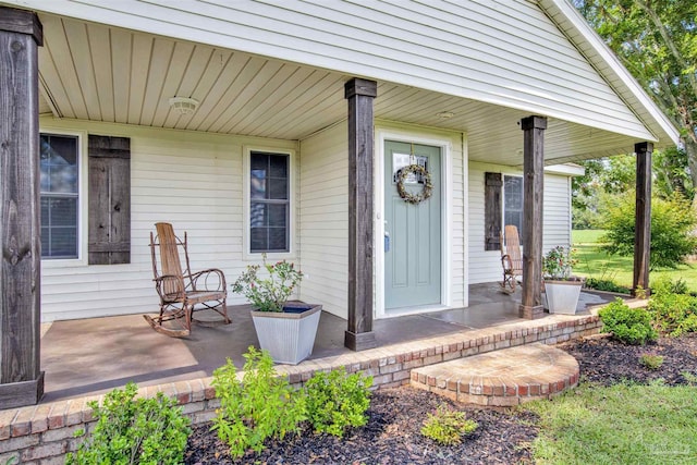 entrance to property with a porch