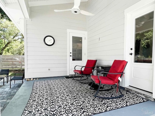 view of patio featuring ceiling fan