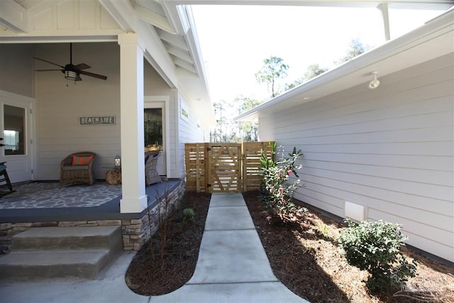 exterior space featuring ceiling fan