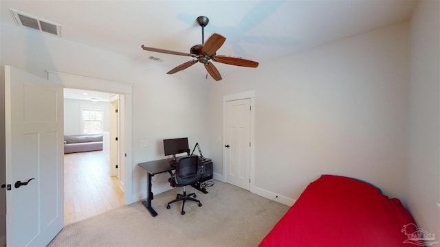 bedroom featuring light hardwood / wood-style flooring and ceiling fan