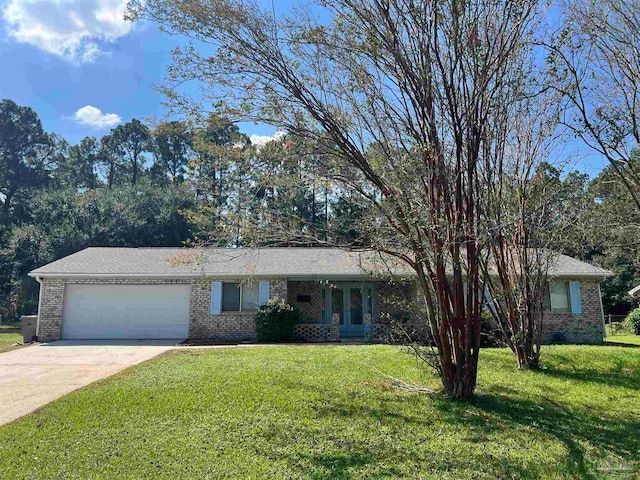 ranch-style house with a front lawn and a garage