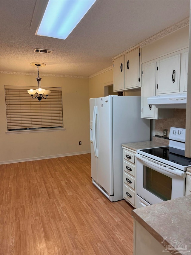 kitchen featuring light hardwood / wood-style floors, white appliances, white cabinetry, and pendant lighting