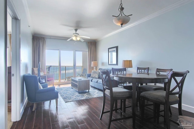 dining space featuring crown molding, ceiling fan, and hardwood / wood-style floors