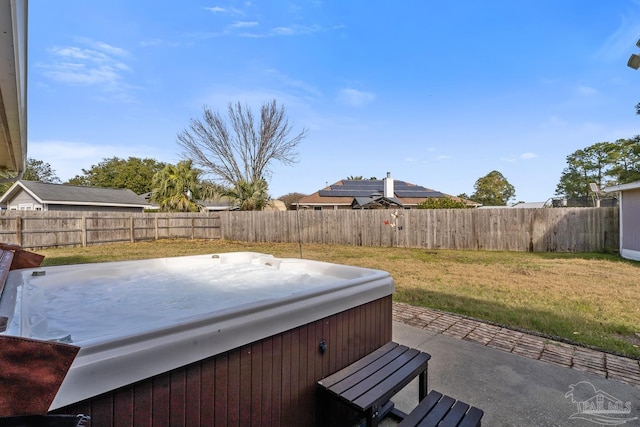 view of patio / terrace featuring a hot tub