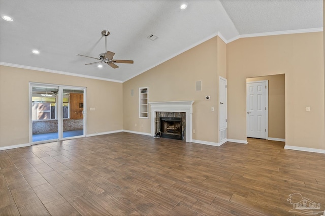 unfurnished living room featuring vaulted ceiling, ceiling fan, crown molding, and hardwood / wood-style floors