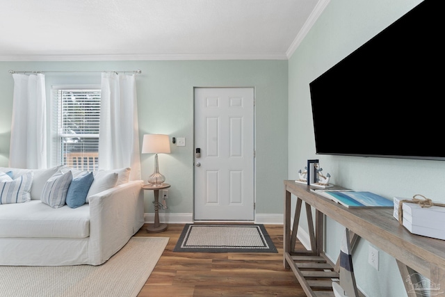 living room featuring ornamental molding and dark hardwood / wood-style floors