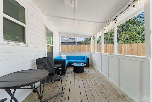 sunroom with a healthy amount of sunlight