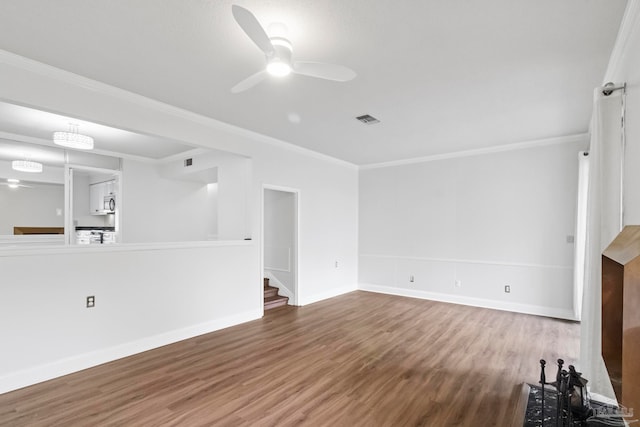 unfurnished living room with ceiling fan, hardwood / wood-style flooring, and ornamental molding