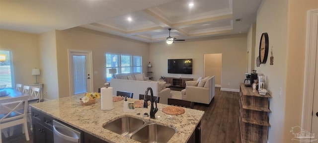 kitchen with coffered ceiling, dark hardwood / wood-style floors, sink, light stone countertops, and ceiling fan