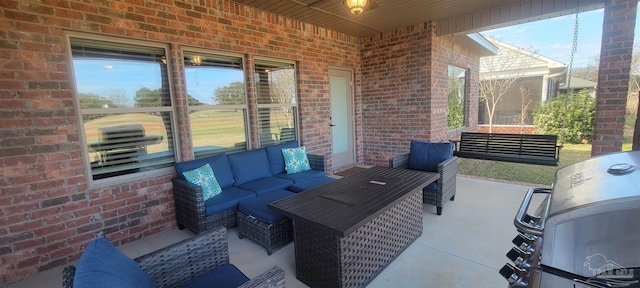 view of patio featuring outdoor lounge area and a grill