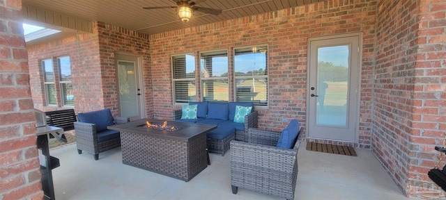 view of patio with outdoor lounge area and ceiling fan