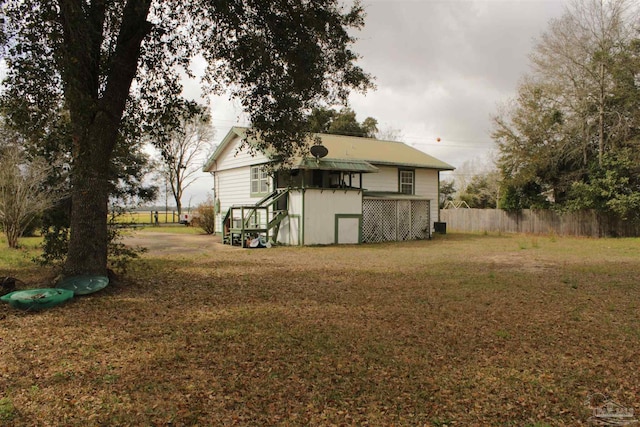 view of yard with fence