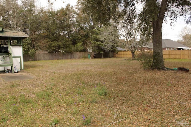 view of yard featuring fence private yard