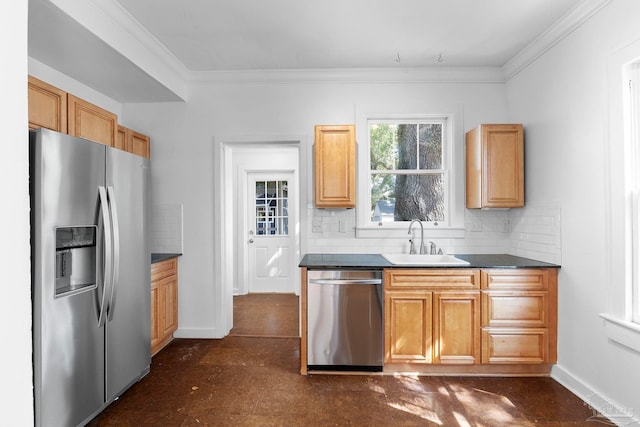 kitchen featuring stainless steel appliances, a sink, backsplash, and crown molding