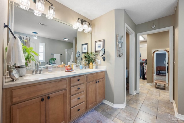 bathroom featuring vanity and tile patterned floors