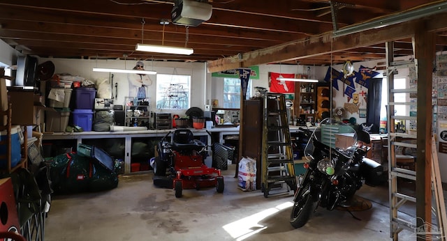 interior space featuring a garage door opener and a workshop area