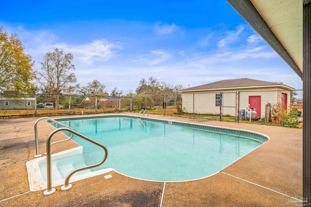 view of pool featuring a patio area