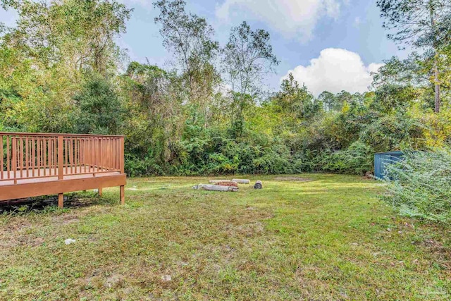 view of yard with a deck