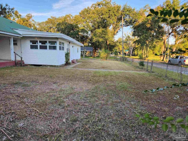 view of yard featuring fence