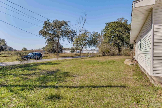 view of yard featuring fence