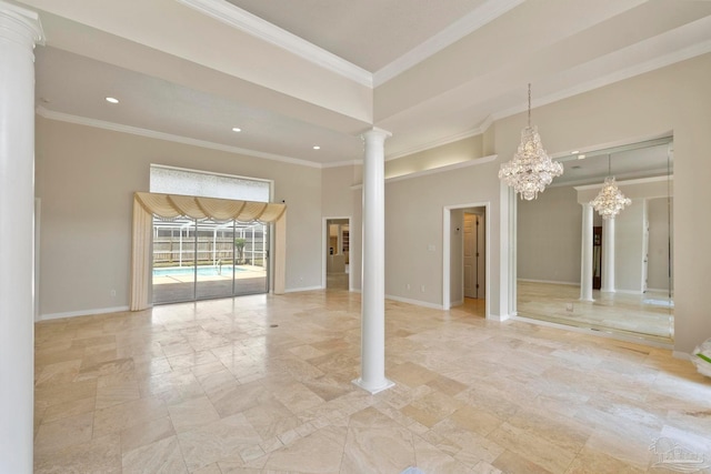 empty room with ornate columns, crown molding, and a chandelier