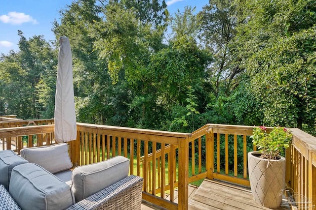 deck with an outdoor hangout area