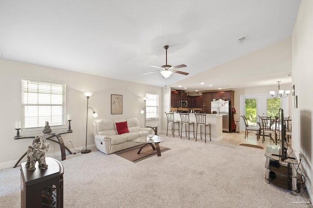 5183 Teresa Dr, Milton, FL 32583 - living area featuring light carpet, ceiling fan, baseboards, a chandelier, and lofted ceiling