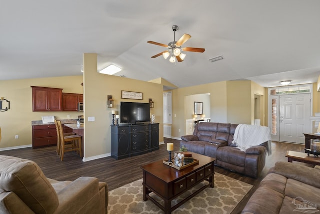 living room with ceiling fan, dark hardwood / wood-style floors, and lofted ceiling