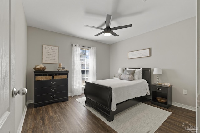 bedroom featuring ceiling fan and dark hardwood / wood-style flooring