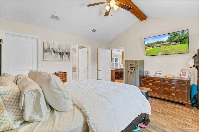 106 W Meadow Dr, Atmore, AL 36502 - bedroom with light wood-style floors, ceiling fan, and ensuite bath