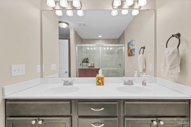 106 W Meadow Dr, Atmore, AL 36502 - bathroom with double vanity and a stall shower