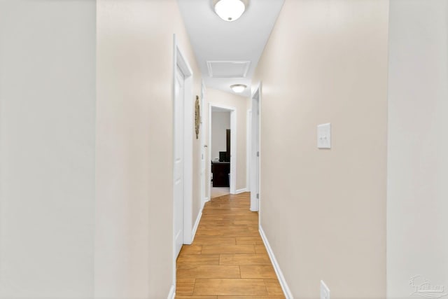 106 W Meadow Dr, Atmore, AL 36502 - corridor featuring light wood-style flooring and baseboards