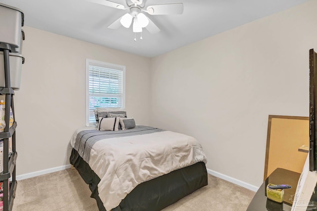 106 W Meadow Dr, Atmore, AL 36502 - bedroom featuring light carpet, baseboards, and a ceiling fan