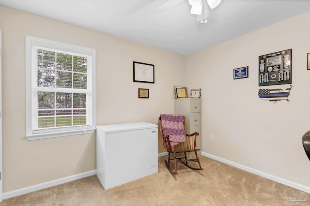 106 W Meadow Dr, Atmore, AL 36502 - sitting room with light carpet, a ceiling fan, and baseboards