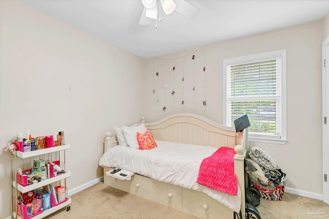 106 W Meadow Dr, Atmore, AL 36502 - carpeted bedroom with baseboards and a ceiling fan
