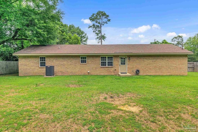 106 W Meadow Dr, Atmore, AL 36502 - rear view of house featuring central air condition unit and brick siding