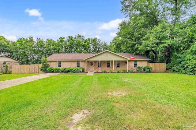 106 W Meadow Dr, Atmore, AL 36502 - ranch-style house featuring concrete driveway and brick siding