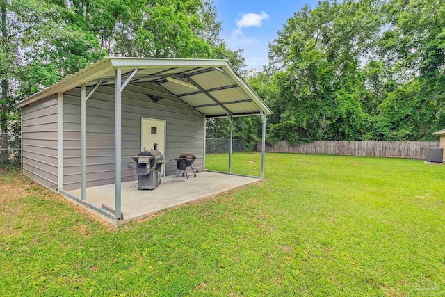 106 W Meadow Dr, Atmore, AL 36502 - view of yard featuring a patio area and central air condition unit