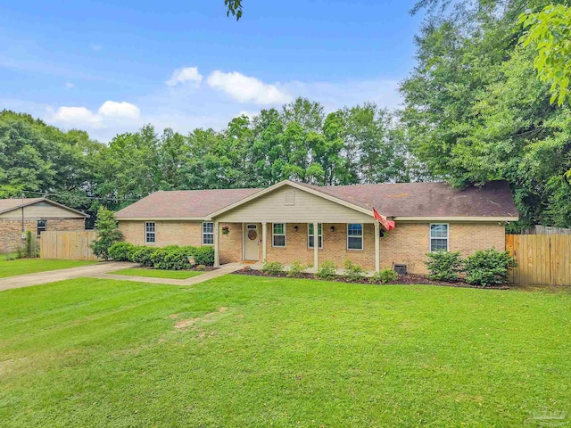 106 W Meadow Dr, Atmore, AL 36502 - ranch-style home featuring brick siding, covered porch, and driveway