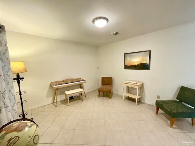 sitting room with light tile patterned flooring