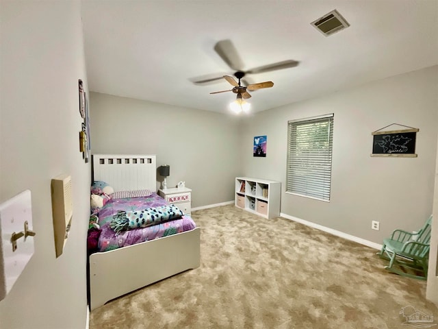 carpeted bedroom with ceiling fan