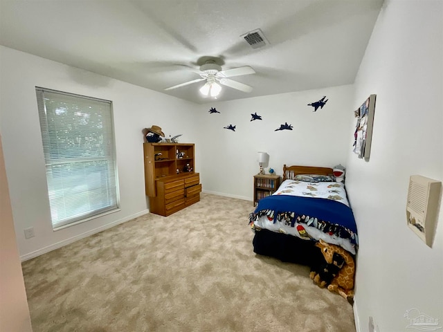 bedroom featuring ceiling fan and light colored carpet