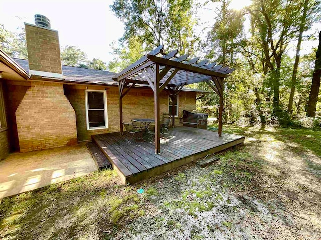 wooden deck with a pergola