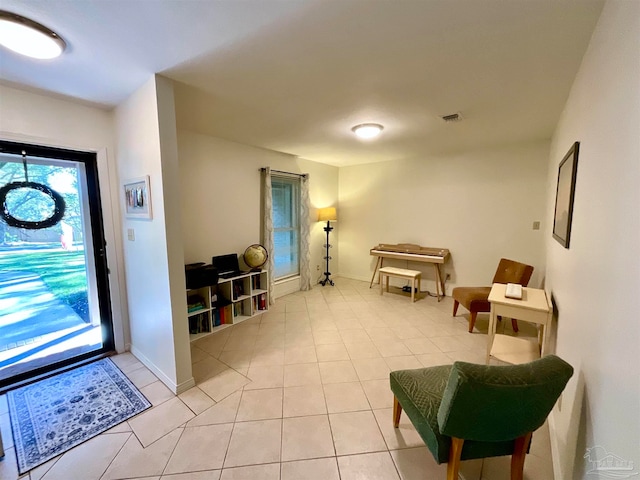 entrance foyer with light tile patterned floors