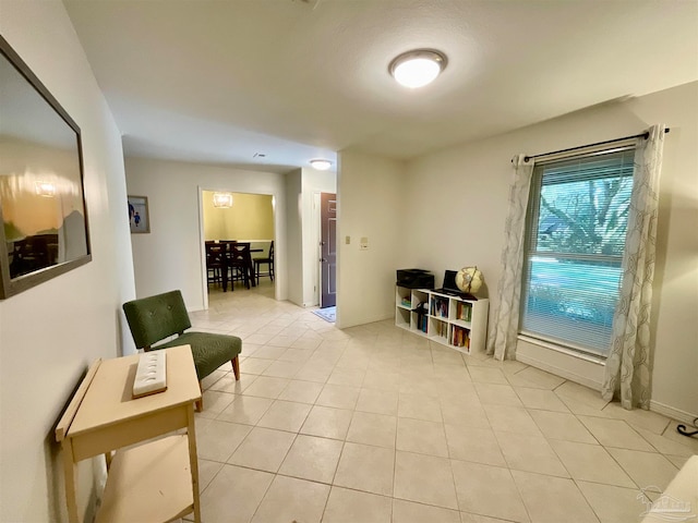 sitting room featuring light tile patterned floors