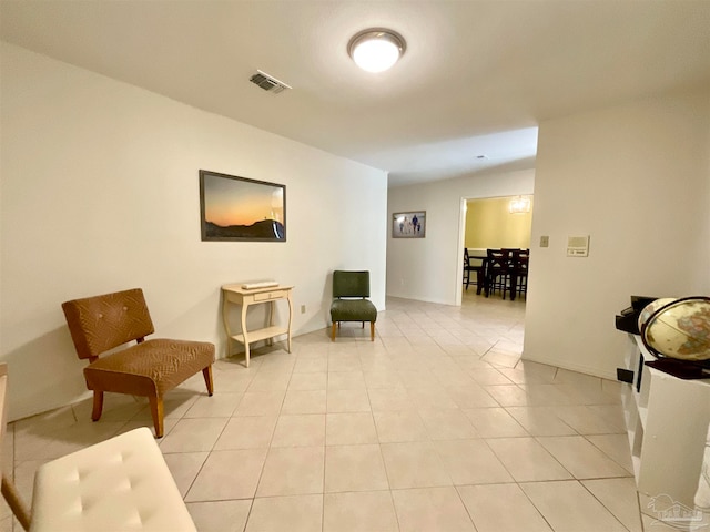 living area featuring light tile patterned floors