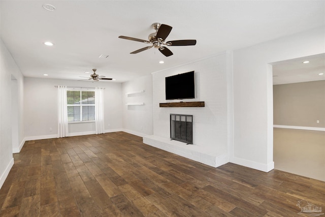 9852 Hillview Dr, Pensacola, FL 32514 - unfurnished living room with a fireplace, wood finished floors, ceiling fan, recessed lighting, and baseboards