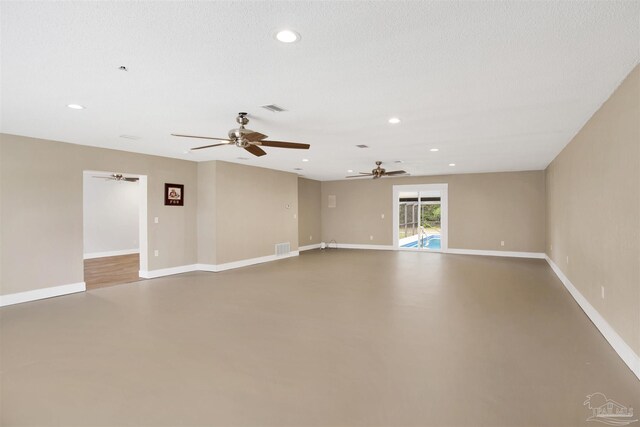 9852 Hillview Dr, Pensacola, FL 32514 - spare room featuring concrete floors, ceiling fan, baseboards, and recessed lighting