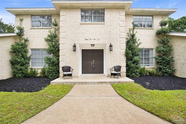 9852 Hillview Dr, Pensacola, FL 32514 - view of exterior entry with brick siding