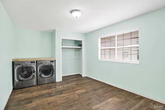 9852 Hillview Dr, Pensacola, FL 32514 - washroom with washer and dryer, dark wood-type flooring, and baseboards